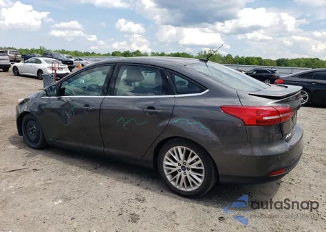 2016 Ford Focus Titanium z USA, uszkodzony, nr VIN 1FADP3J29GL384695